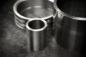 Machined non-magnetic alloy rings and sleeves