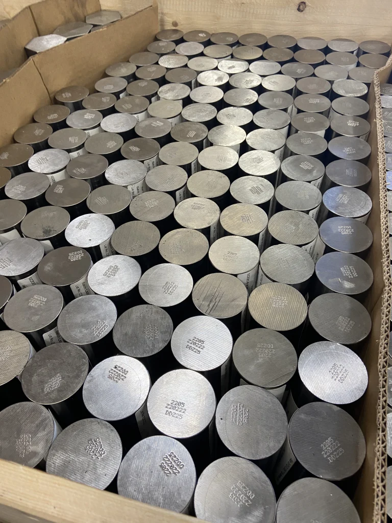 Corrosion-resistant alloy bar packed in a timber crate, ready for dispatch